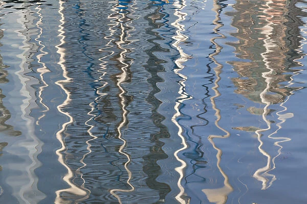 USA, California, San Diego, Seaport Village. Abstract water reflections of sailboats