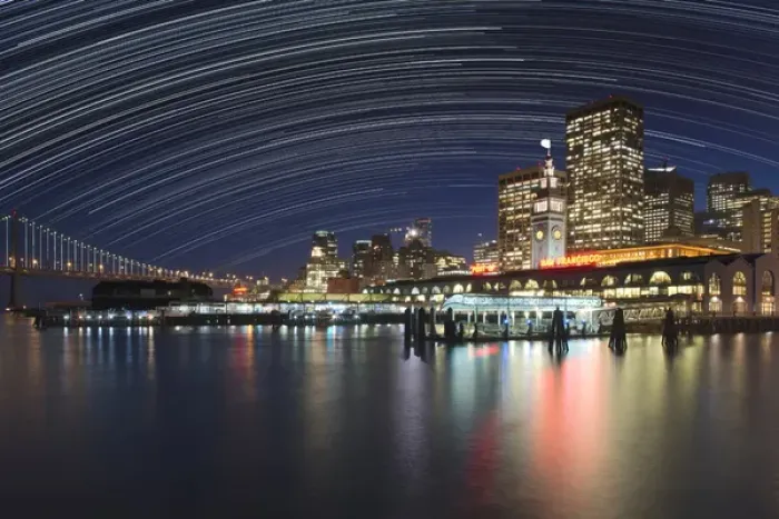 Framed Print : USA, California, San Francisco. Composite of star trails above downtown. Credit as Framed Print : USA, California, San Francisco. Composite of star trails above downtown. Credit as