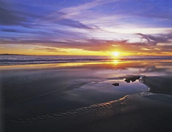 USA, California, Santa Barbara. Sunset on the ocean and beach