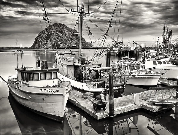 USA, California, Sepia-tinted fishing boats docked in Morro Bay at dawn