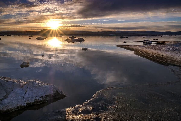 Usa, California, Sierra Nevada, Mono Lake. The sun rises over the east shore of Mono Lake, as seen from the north shore