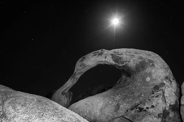 USA, California, Sierra Nevada Mountains. Moonrise over arch in Alabama Hills. Credit as