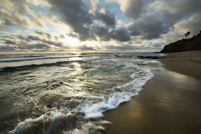 Framed Print : USA, California, Sunset Cliffs Park. Wave on beach at sunset Framed Print : USA, California, Sunset Cliffs Park. Wave on beach at sunset