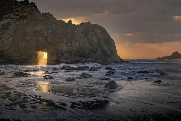 Framed Print : Usa, California. Sunsets gleams through this hole in the rock along the Big Sur coast Framed Print : Usa, California. Sunsets gleams through this hole in the rock along the Big Sur coast