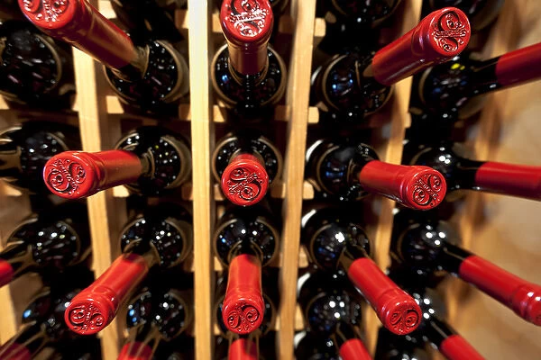 USA, California, Temecula. Wine bottles in a rack