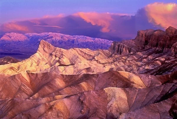 USA, California. View from Zabriske Point of Death Valley National Parkstorm clouds at sunrise
