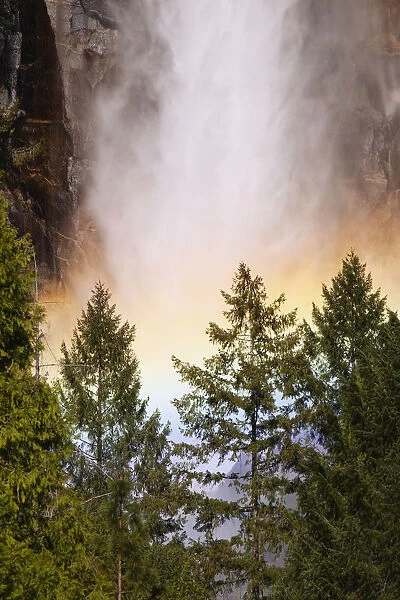 USA, California, Yosemite National Park. Rainbow at base of Yosemite Falls. Credit as