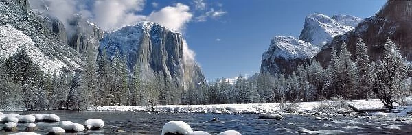 USA, California, Yosemite NP. The Merced River, here dotted with snow-capped rocks