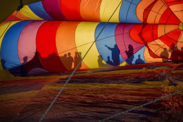 Framed Print : USA, Colorado, Colorado Springs. Hot air balloon inflates at the Colorado Balloon Festival Framed Print : USA, Colorado, Colorado Springs. Hot air balloon inflates at the Colorado Balloon Festival