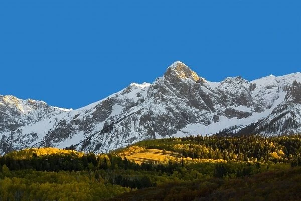 USA, Colorado, Dallas Divide, Sunset on Mt. Sneffles with Autumn Color