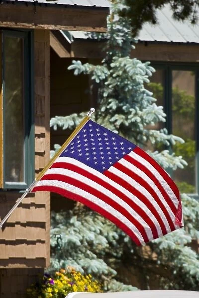 USA, Colorado, Frisco. American flag waves in front of home on July FourthFred J