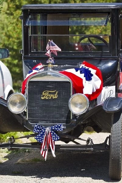 USA, Colorado, Frisco. Vintage Ford passenger car decorated for July Fourth paradeFred J