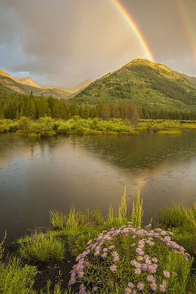 USA, Colorado, Gunnison National Forest. Rainbows over Slate River Valley. Credit as