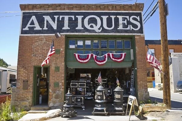 USA, Colorado, Idaho Springs. Outside of antique store decorated with American flags