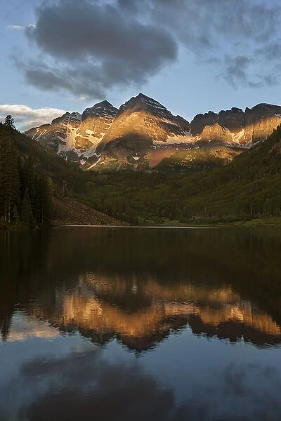 USA, Colorado, Maroon Bells State Park. Sunrise on Maroon Bells mountains. Credit as