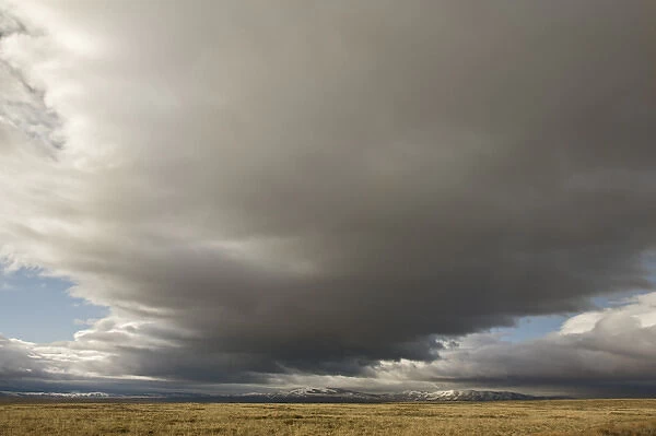 USA, Colorado, North Park. Storm clouds sweep across plain. Credit as: Don Grall