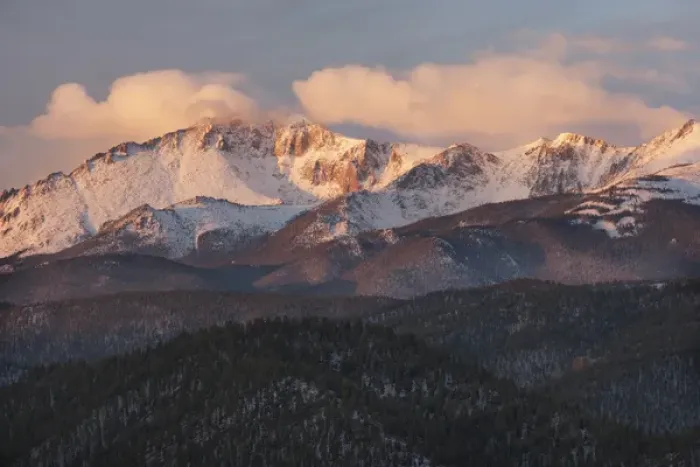 Framed Print : USA, Colorado, Pike National Forest. Clouds over Pikes Peak at sunrise. Credit as