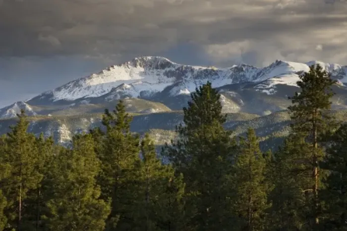 Framed Print : USA, Colorado, Pikes Peak. Dark storm clouds hover over mountain Framed Print : USA, Colorado, Pikes Peak. Dark storm clouds hover over mountain