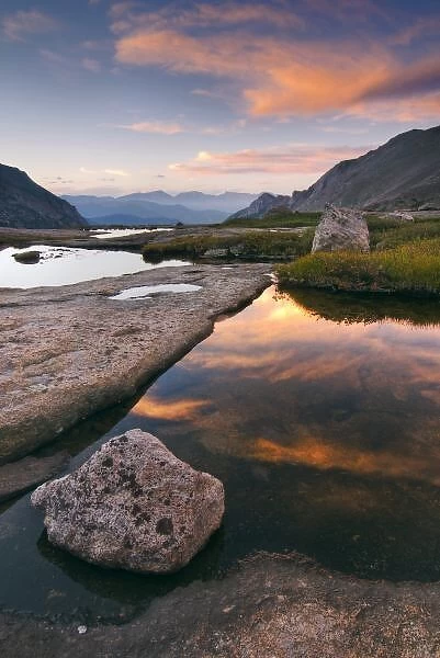 USA, Colorado, Rocky Mountain NP. Sunrise in Glacier Gorge on a peaceful mountain pond