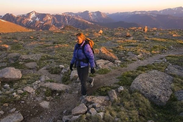 USA, Colorado, Rocky Mountain NP. A female hiker on the Longs Peak trail. (MR)