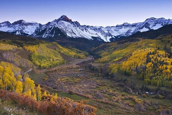 USA, Colorado, Rocky Mountains, San Juan Mountains. Fall colors and alpenglow on Mt