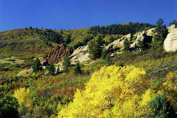 USA, Colorado, Roxborough State Park. Mountains and bluffs covered in autumn colors