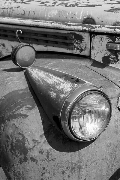 USA, Colorado. Rusty old vintage truck. Headlight detail