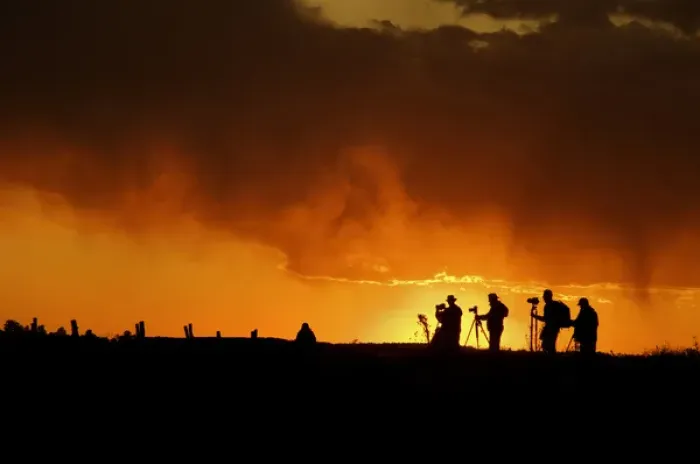 Framed Print : USA, Colorado, San Juan Mountains. Silhouette of photographers at sunset. Credit as