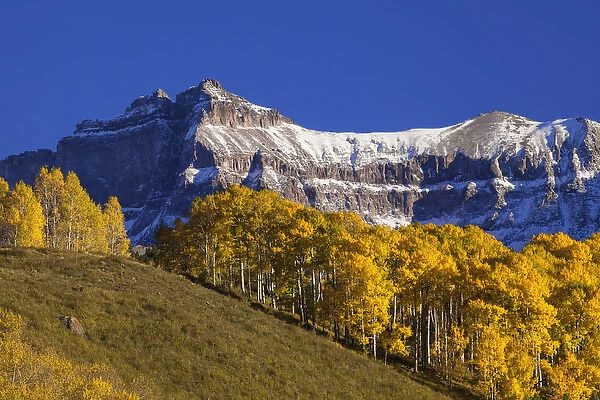 USA, Colorado, San Juan Mountains. Mountain and autumn-colored forest. Credit as