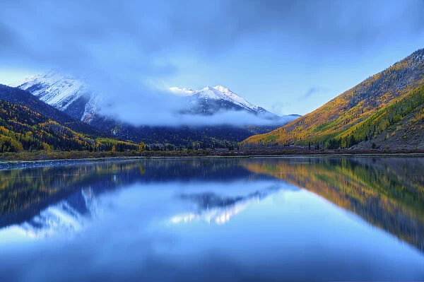 USA, Colorado, San Juan Mountains. Sunrise on mountain and Crystal Lake. Credit as
