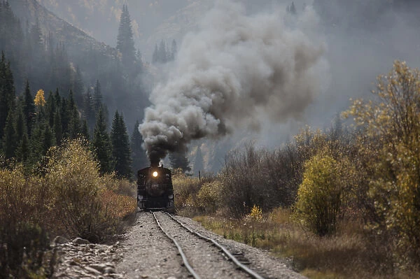USA, Colorado, Silverton. Durango & Silverton Narrow Gauge train climbs grade. Credit as