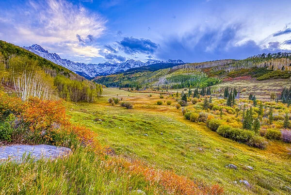 USA, Colorado, Sneffels Range. Sunset on mountain and valley autumn landscape
