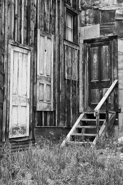USA, Colorado, St. Elmo. Weathered doors in wood building