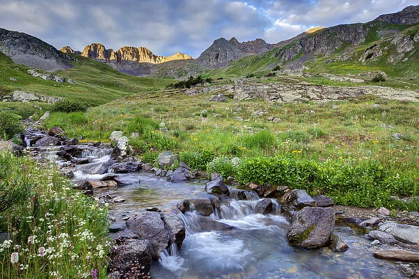 USA, Colorado. Sunrise on stream in American Basin in the San Juan Mountains. Credit as