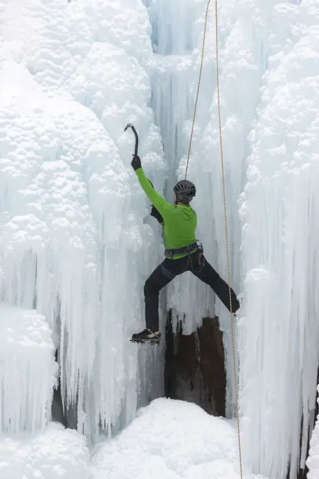 Framed Print : USA, Colorado, Uncompahgre National Forest. Climber ascends ice-encrusted cliff face