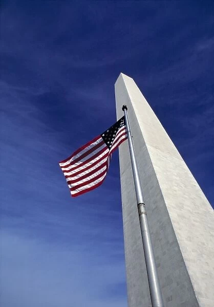 USA, District of Columbia. Against a deep blue sky, an American flag waves before