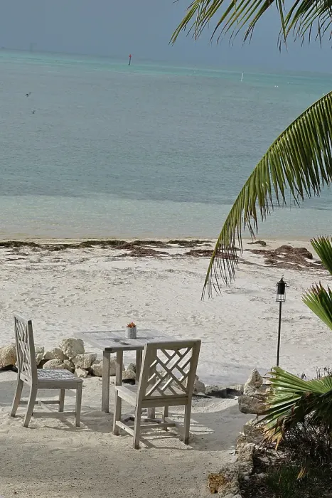 Framed Print : USA, Florida, Little Palm Island. Dinner on the beach. (Editorial Use Only)