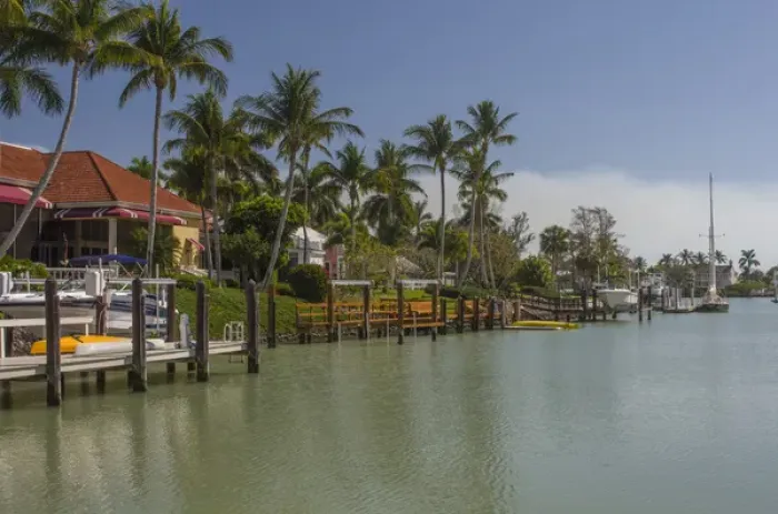 Framed Print : USA, Florida, Naples. Luxury homes in the Port Royal neighborhood line a canal by Framed Print : USA, Florida, Naples. Luxury homes in the Port Royal neighborhood line a canal by