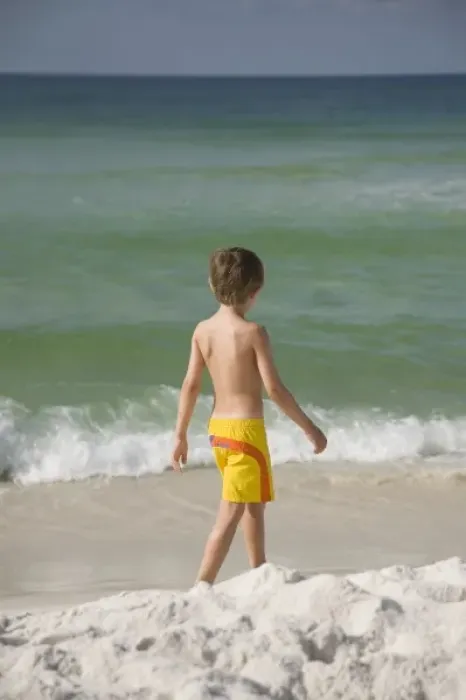 Framed Print : USA; Florida; Pensacola; Child walking on the beach. (MR) Framed Print : USA; Florida; Pensacola; Child walking on the beach. (MR)