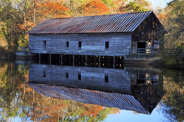 USA, Georgia, Grist mill with fall reflections in pond
