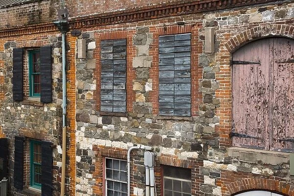 USA, Georgia, Savannah. Historic cobblestone building along Factors Walk