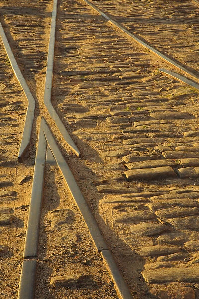 USA, Georgia, Savannah. Old railroad tracks along ballast stones at River Street