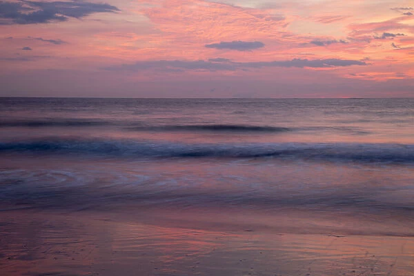 USA, Georgia, Tybee Island. Colorful pink sunrise at Tybee Beach