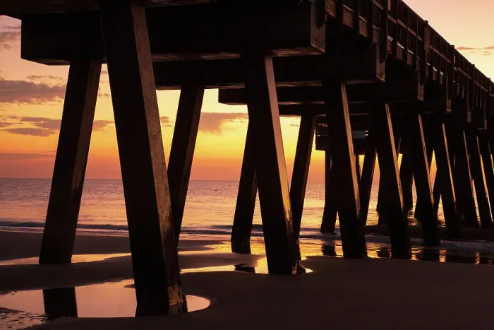 Framed Print : USA, Georgia, Tybee Island. Pier silhouetted in the sunrise
