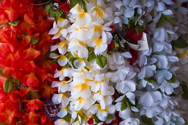 USA, Hawaii. Colorful lei hanging at an outdoor market