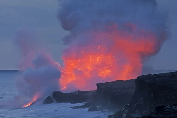 USA, Hawaii, Hawaii Volcanoes National Park. Lava explodes as it runs into ocean