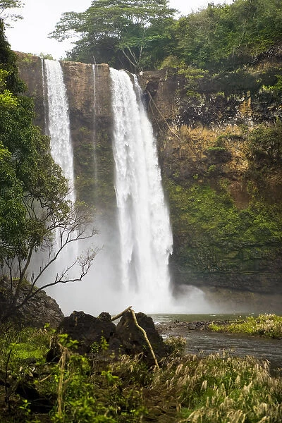 USA, Hawaii. This majestic, 80-foot tiered waterfall is located close to the roadside