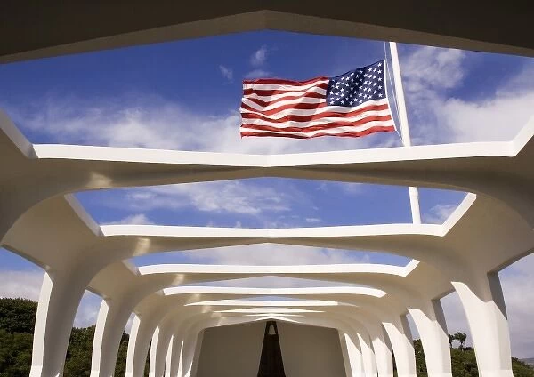 USA, Hawaii, Oahu. American flag flies at half-mast over USS Arizona National Memorial