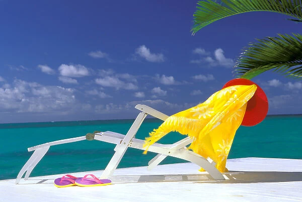 USA, Hawaiian Islands. Lounge chair on oceanside deck