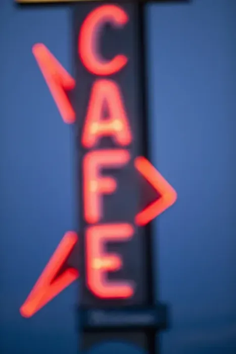Framed Print : USA, Idaho, Arco, Neon Cafe sign at dusk